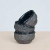 Stone Age black tea cup