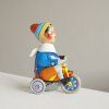 Boy on a tricycle